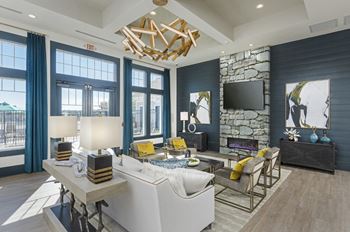 Evolv at stonehaven in white plains, maryland clubhouse lounge with fireplace